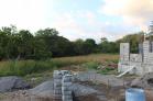 Se vende lote en Algarrobos colindante a una barriada. Chiriqu